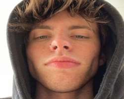 Clark has a piercing in his nose.